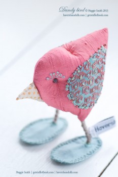 Stuffed fabric "Dandy Bird" by Maggie Smith for "Stitch" Magazine issue 81, with Tete-de-boeuf stitch detail on wing.